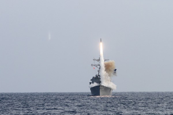 The Arleigh Burke-class guided-missile destroyer USS Lassen launches a Standard Missile as a part of Multi Sail 13 in the Pacific Ocean