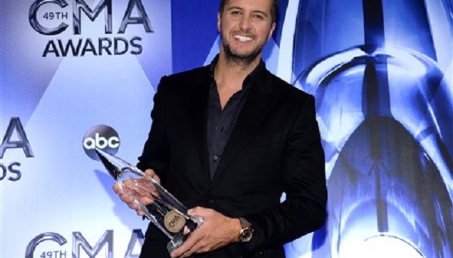 Luke Bryan winner of the award for entertainer of the year poses in the press room at the 49th annual CMA Awards at the Bridgestone Arena on Wednesday Nov. 4 2015 in Nashville Tenn