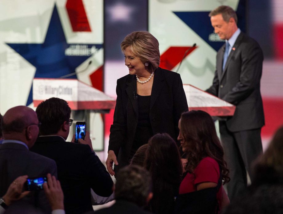 FILE- Hillary Rodham Clinton speaks to attendees of a Democratic debate in Des Moines Iowa Nov. 14 2015. With the liberal wing of the Democratic party ascendant Clinton's relationship with banks and financial services firms has become a major vulnera