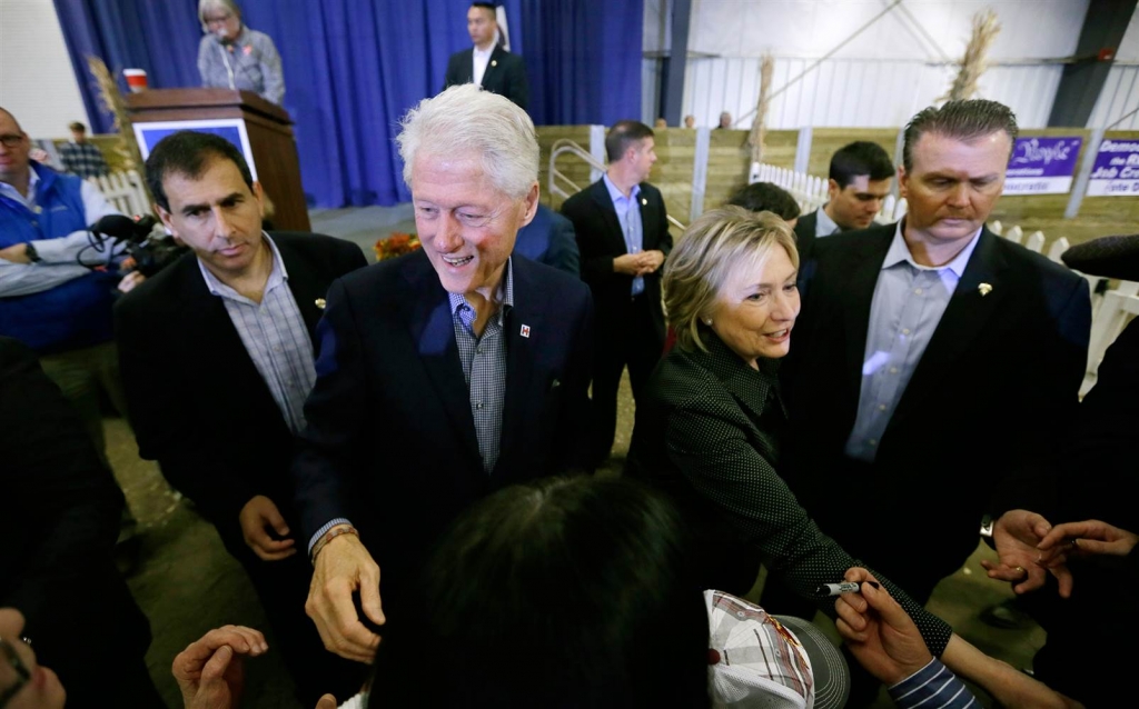 Image Hillary Rodham Clinton and Bill Clinton greet supporters at the Central Iowa Democrats Fall Barbecue