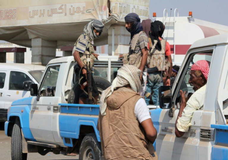 AFP  Saleh Al-ObeidialehYemeni fighters loyal to Yemen's Saudi-backed President Abedrabbo Mansour Hadi patrol a street in the southern port city of Aden