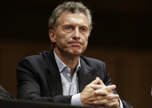 Argentina's President elect Mauricio Macri listens to a question during a press conference in Buenos Aires Argentina Monday Nov. 23 2015. Macri won Argentina's runoff election against ruling party candidate Daniel Scioli putting an end to the era