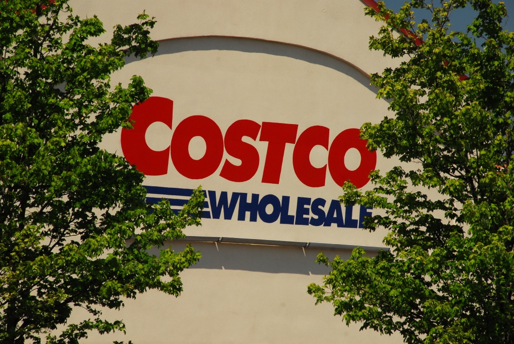 Cars fill the parking lot of a Costco store Tuesday Nov. 24 2015 in Seattle. Health authorities say chicken salad from Costco has been linked to at least one case of E. coli in Washington state