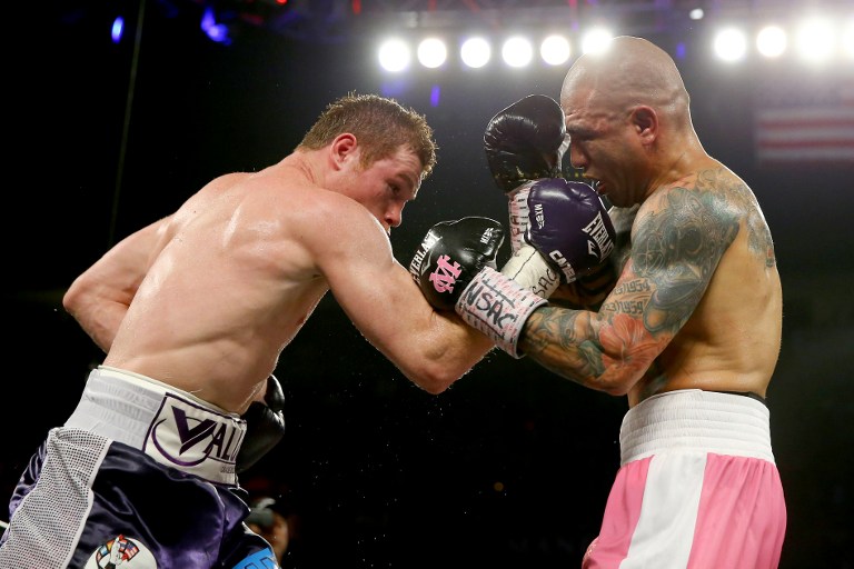 Alvarez beats Cotto, wins WBC middleweight title