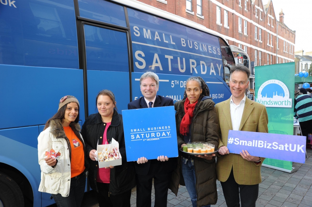 Councillor Guy Senior with traders from Balham with the Small Business Saturday bus