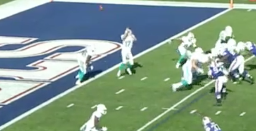 Dolphins take safety off bad snap on first play vs. Bills