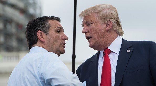 US Republican presidential candidate Donald Trump is greeted on stage by fellow Republican candidate Ted Cruz before speaking at a rally organized by the Tea Party Patriots against the Iran nuclear deal in front of the Capitol in Washington DC on Se