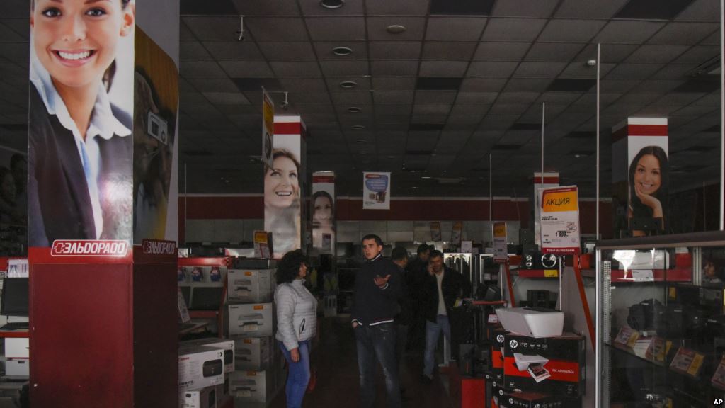 Customers are seen standing in an electronics store after a power failure in Simferopol Crimea Nov. 22 2015