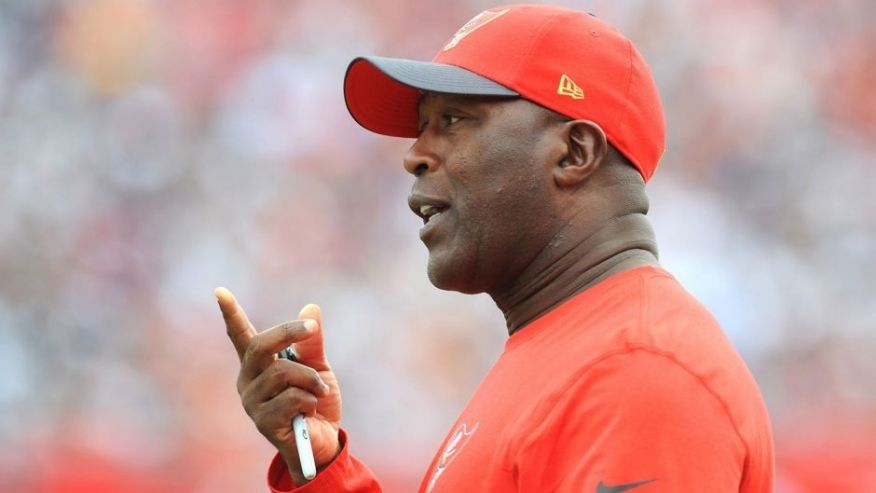 TAMPA FL- NOVEMBER 15 Head coach Lovie Smith of the Tampa Bay Buccaneers questions an officials call in the second quarter against the Dallas Cowboys at Raymond James Stadium