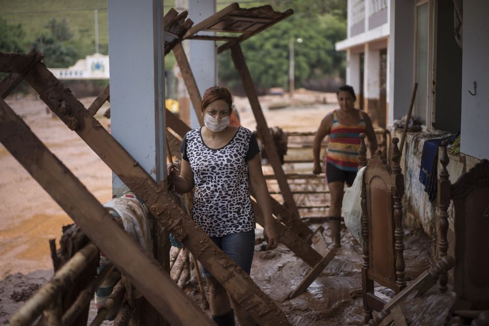 Brazil rescuers search for 19 missing after dams burst