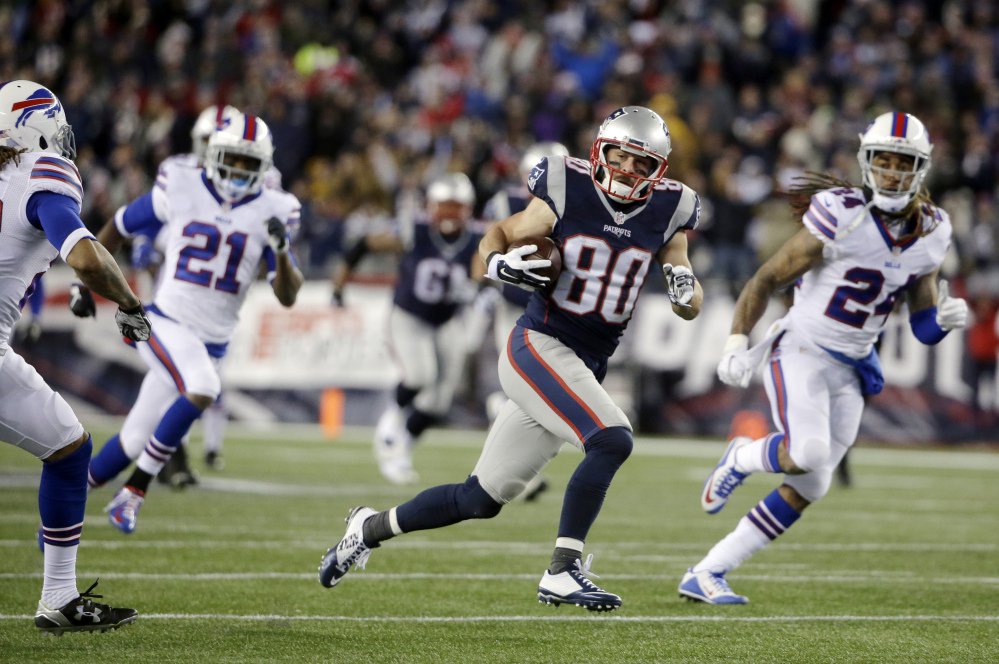 New England Patriots wide receiver Danny Amendola runs after catching a pass against the Buffalo Bills. Amendola did not travel with the Patriots to Denver because of a knee injury