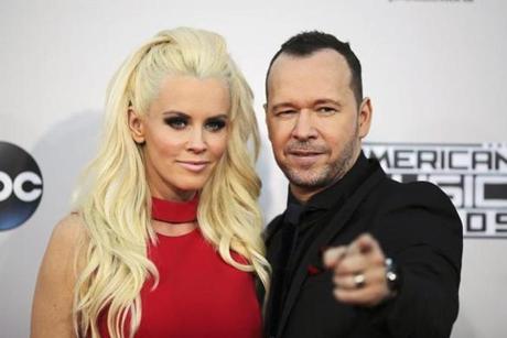 Actors Jennie Mc Carthy and Donnie Wahlberg arrive at the 2015 American Music Awards in Los Angeles California