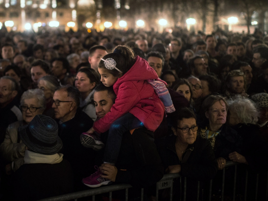 People gather outside of Notre Dame Cathedral in Paris ahead of a ceremony for the victims of Friday's terrorist attacks. Even as we mourn for those lost in the violence Michel Martin says we should not forget the many who have died in similar att