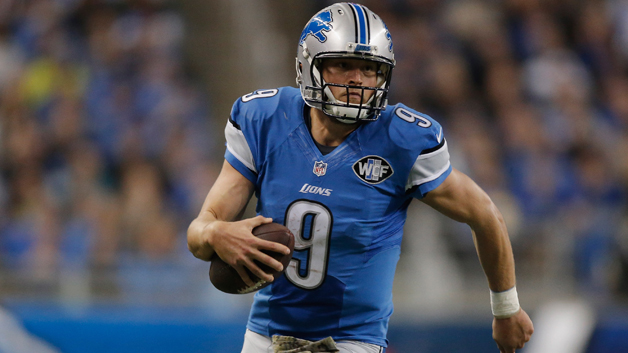 DETROIT MI- NOVEMBER 22 Matthew Stafford #9 of the Detroit Lions runs the ball in the fourth quarter while playing the Oakland Raiders at Ford Field