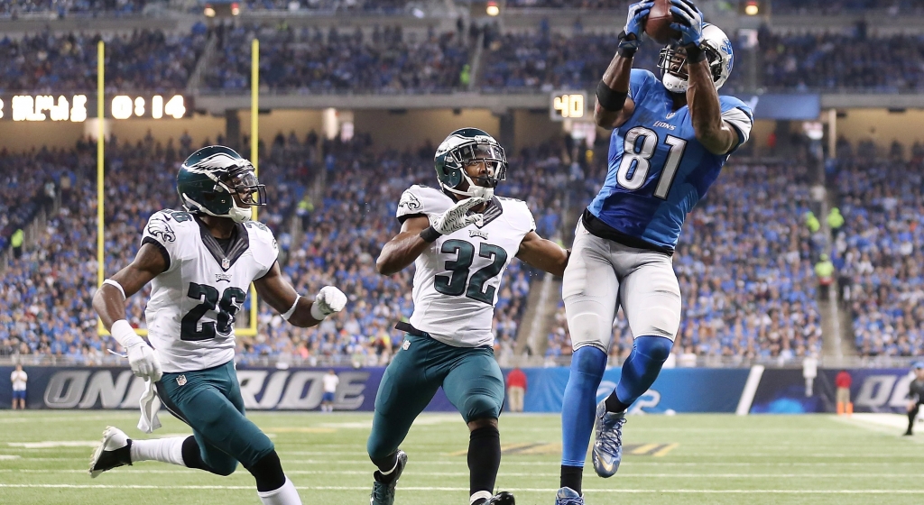 DETROIT MI- NOVEMBER 26 Wide receiver Calvin Johnson #81 of the Detroit Lions catches a second quarter touchdown in front of Walter Thurmond #26 and cornerback Eric Rowe #32 of the Philadelphia Eagles