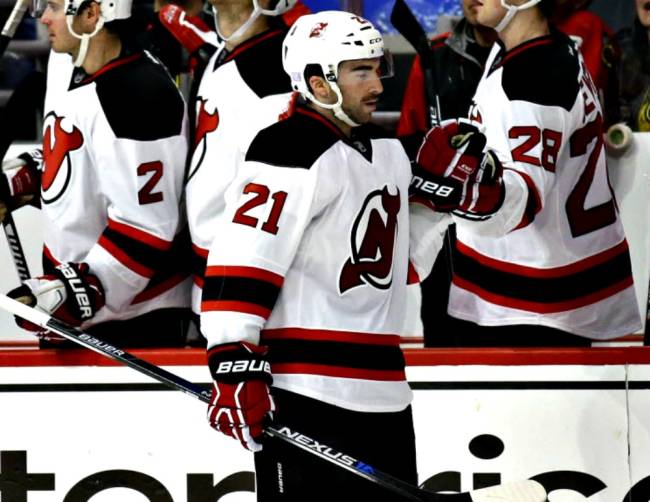 Devils right wing Kyle Palmieri celebrates with teammates after scoring against the Chicago Blackhawks during the second period Thursday