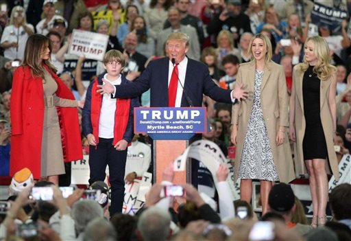 Republican presidential candidate Donald Trump middle speaks near his wife Melania left son Baron daughter Ivanka second from right and daughter Tiffany during a campaign event at the Myrtle Beach Convention Center on Tuesday Nov. 24 2015 in My