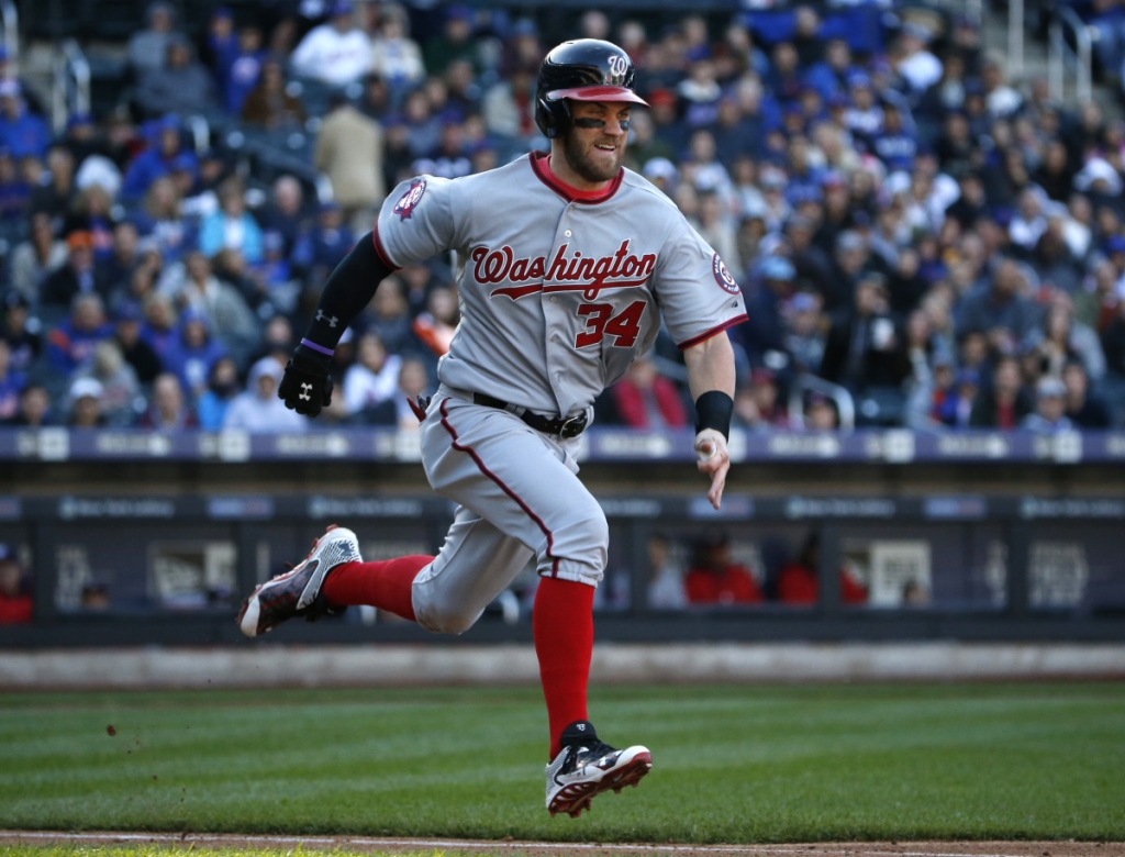 Washington Nationals Bryce Harper trying for the National League batting title runs out a ground ball in the seventh inning of a baseball game in New York Sunday Oct. 4 2015