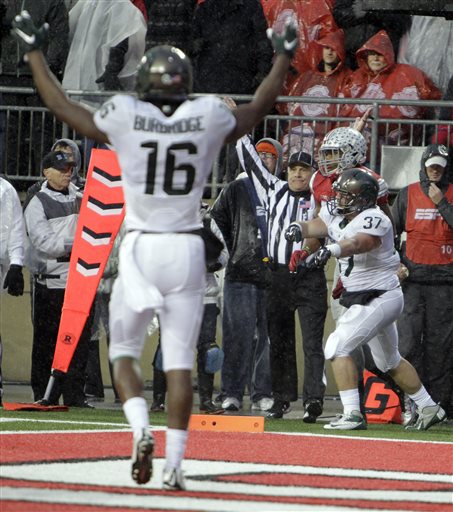 Michigan State fullback Trevon Pendelton right celebrates his touchdown against Ohio State during the second quarter of an NCAA college football game Saturday Nov. 21 2015 in Columbus Ohio