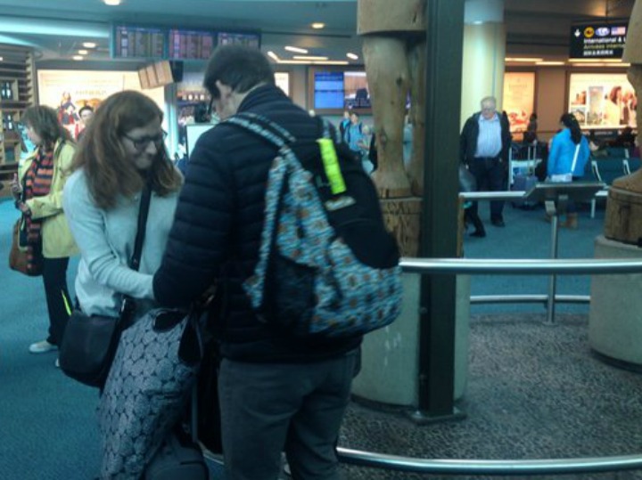 A woman arrives at YVR from Paris