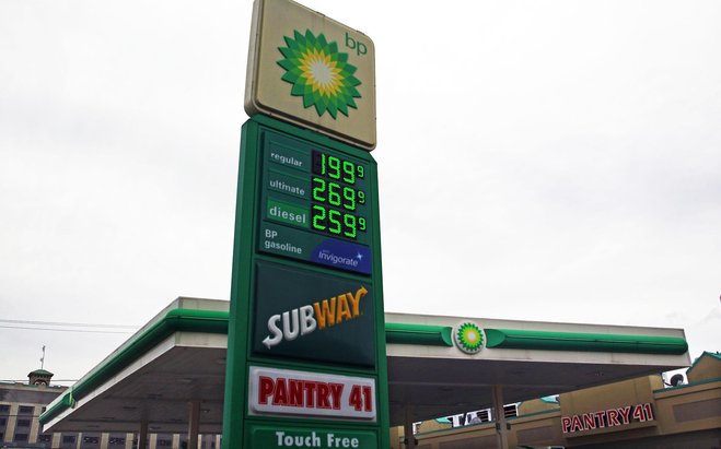 The prices of regular unleaded gasoline has dropped just below $2 at this BP gas station at the corner of S. 1st St. and W. Mineral St. in MIlwaukee