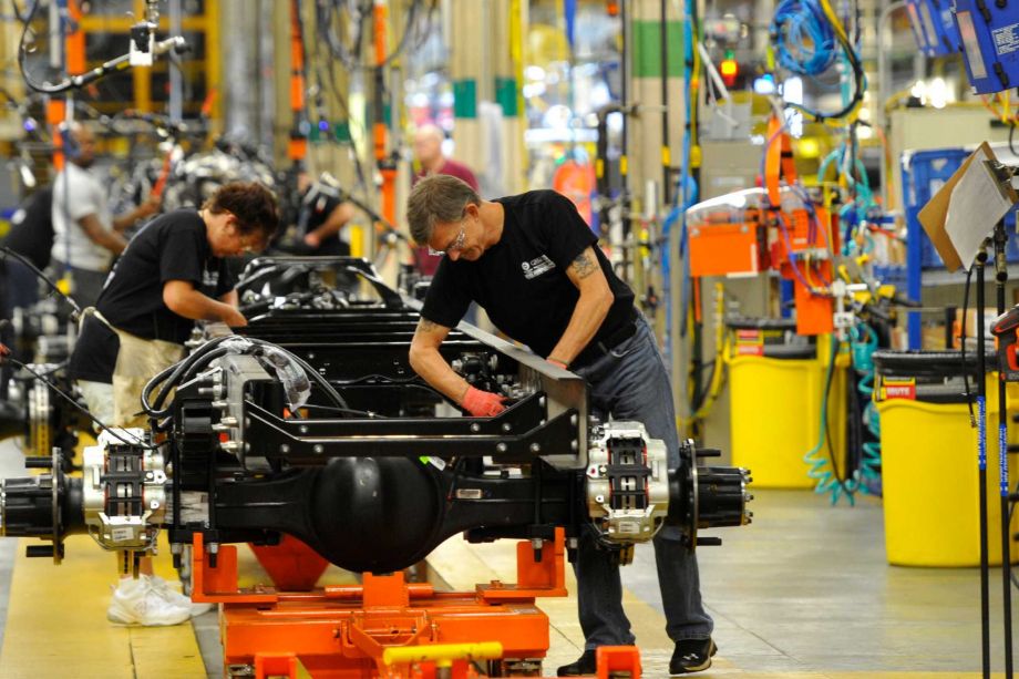 Workers assemble a truck at Ford's plant in Avon Lake Ohio. The United Auto Workers has reached a tentative contract agreement with Ford