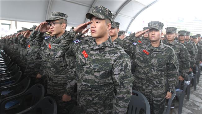 South Korean marines salute during a ceremony to mark the fifth anniversary of North Korea’s artillery attack on Yeonpyeong Island at Korea War Memorial Museum in Seoul South Korea