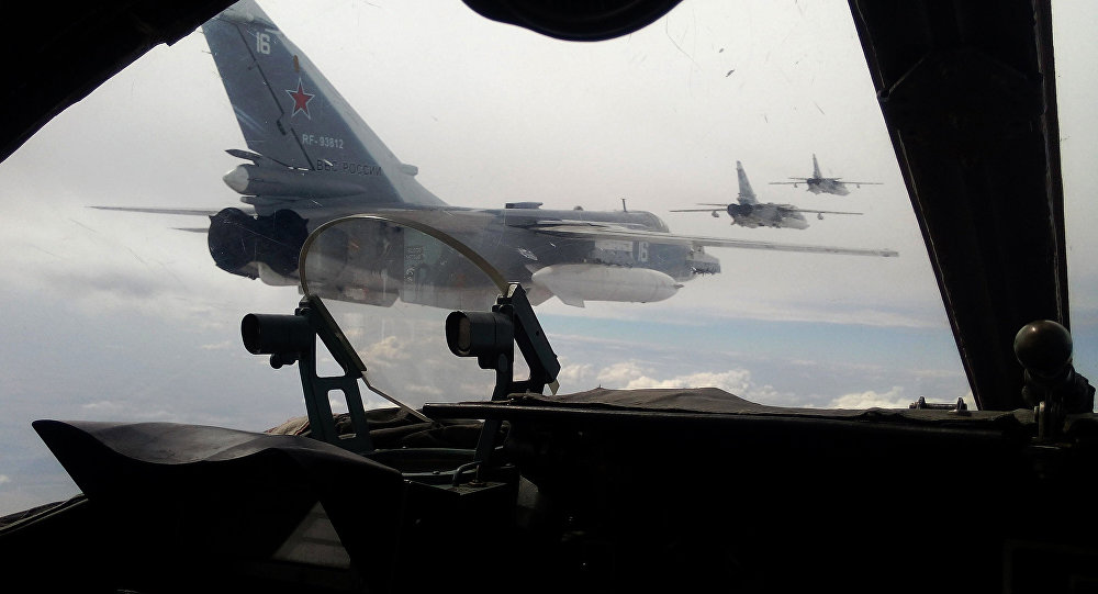 Russian Air Force Su-24 bombers fly during a military exercise in southern Russia