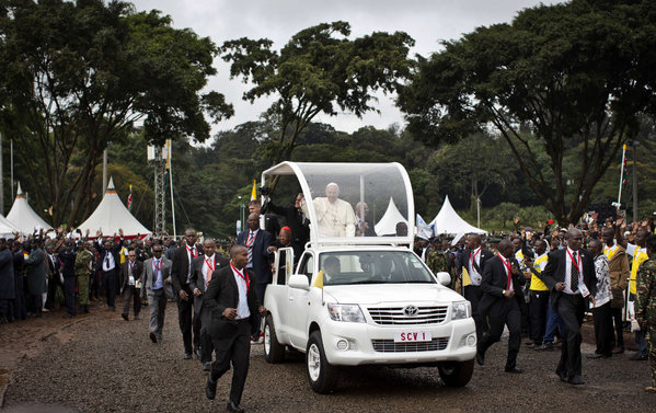 BEN CURTIS  ASSOCIATED PRESS Pope Francis arrives yesterday at the University of Nairobi for a public Mass in Kenya