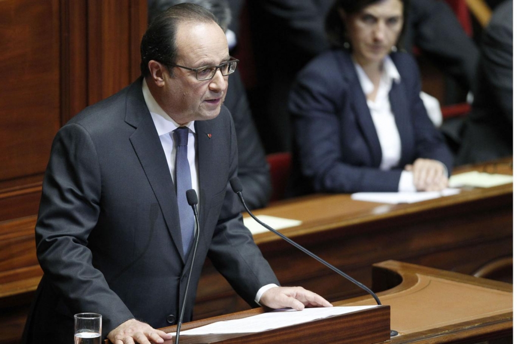 French PM warns of more attacks as police raid suspect Islamist homes