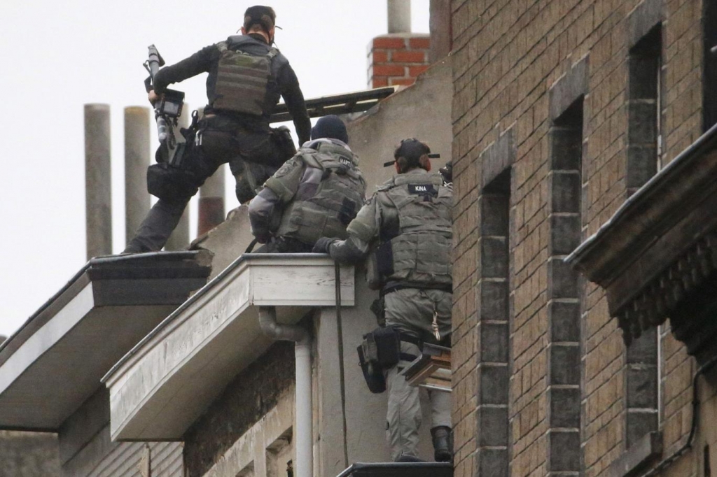 Paris attacks: French police carry out 168 raids and arrest 23 as Belgian