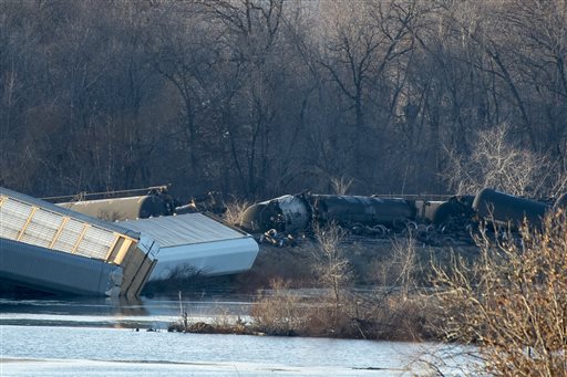 Train cars lie overturned outside of Alma Wis. after derailing on Saturday Nov. 7 2015. BNSF Railway says five tanker cars leaked ethanol into the Mississippi River. MANDATORY CREDIT ST. PAUL PIONEER PRESS OUT MAG