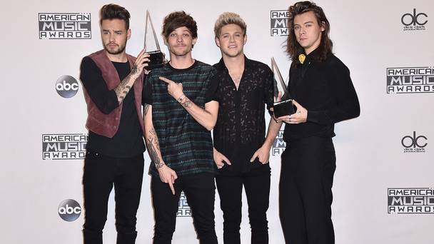 From left Liam Payne Louis Tomlinson Niall Horan and Harry Styles of One Direction with their awards