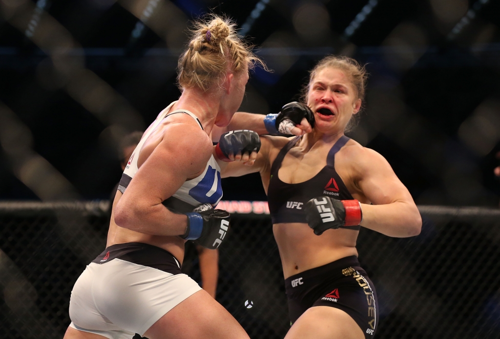 MELBOURNE AUSTRALIA- NOVEMBER 15 Ronda Rousey of the United States and Holly Holm of the United States compete in their UFC women's bantamweight championship bout during the UFC 193 event at Etihad Stadium