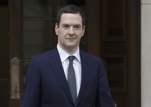 Chancellor of the Exchequer George Osborne leaves the Treasury in London for the House of Commons where he will deliver his joint Autumn Statement and Spending