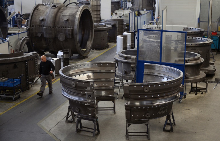 AFP  File  Johannes EiseleA Siemens employee works on a gas turbine at the company's factory in Berlin