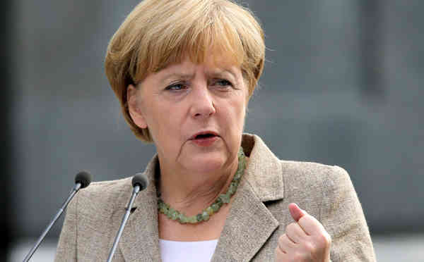 Germany's Angela Merkel has supported the decision to cancel a football match over security threats