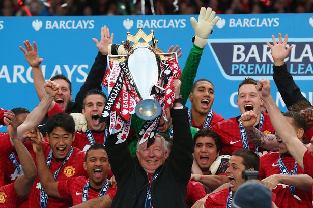 Manchester United Manager Sir Alex Ferguson lifts the Premier League trophy