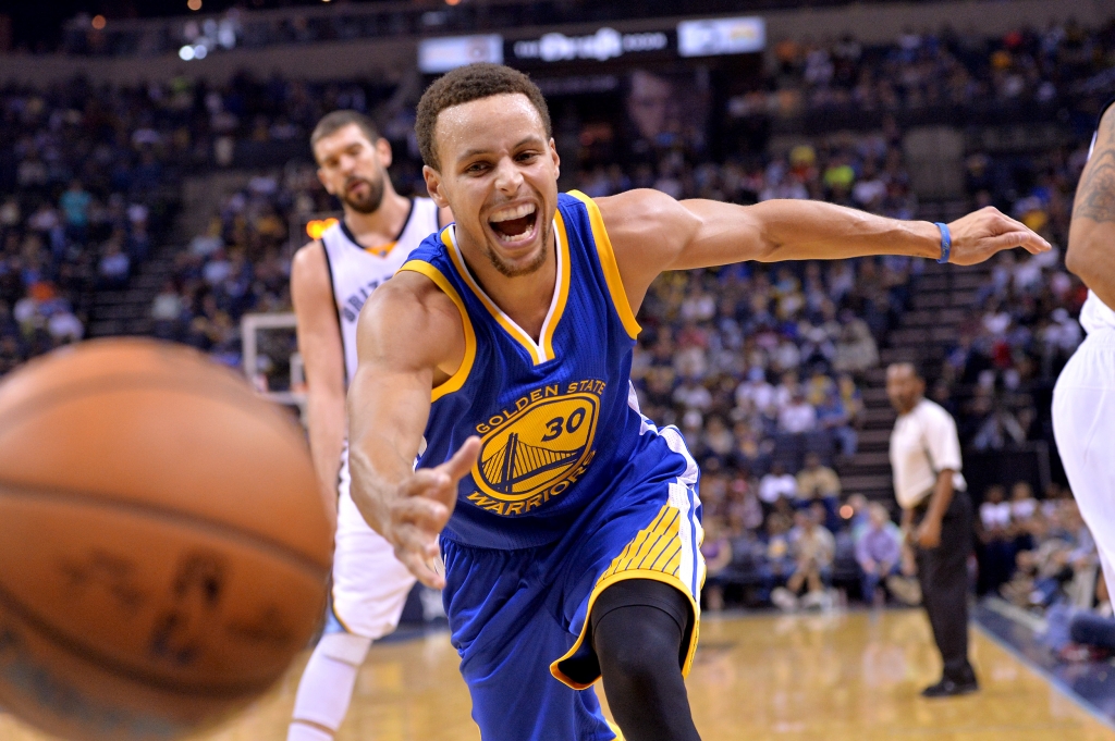 Golden State Warriors guard Stephen Curry chases the ball after knocking it loose from Memphis Grizzlies guard Courtney Lee in the second half of an NBA basketball game Wednesday Nov. 11 2015 in Memphis Tenn