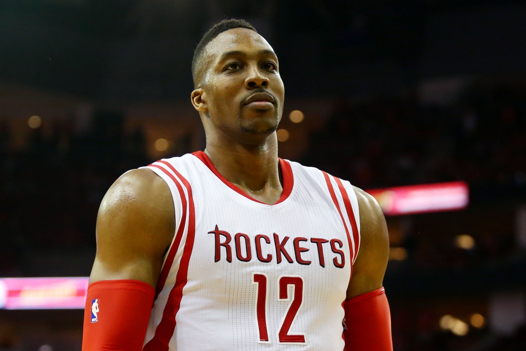 HOUSTON TX- MAY 25 Dwight Howard #12 of the Houston Rockets reacts in the fourth quarter against the Golden State Warriors during Game Four of the Western Conference Finals of the 2015 NBA Playoffs at Toyota Center