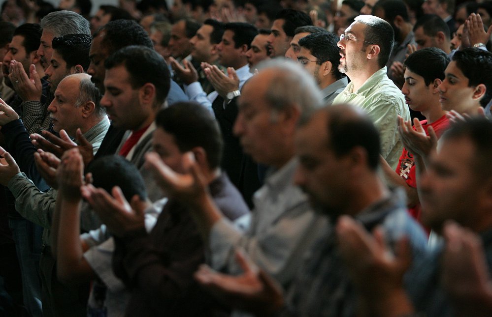 Muslims pray at the The Islamic Center of America mosque in Dearborn Mich. Although President George W. Bush often distinguished between ordinary Muslims and the extremist fringe current Republican presidential candidates are making some of the most inc