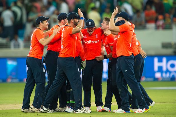 England's team members celebrate their victory during the second T20 cricket match between Pakistan and England at the Dubai International Cricket Stadium