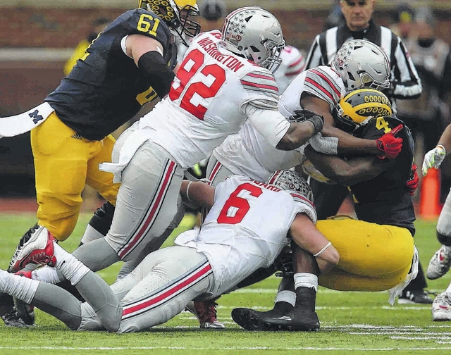 No. 8 Ohio State tops No. 12 Michigan 42-13