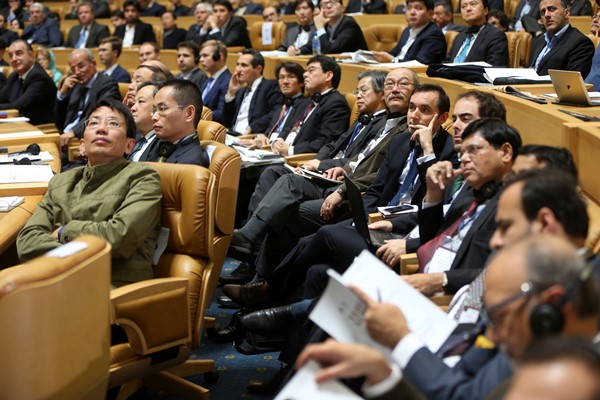 Foreign participants watch a video clip during the Iran Petroleum Contracts Conference in Tehran Iran on Nov. 28 2015. Iran has unveiled a new model of oil contracts aimed at attracting foreign investments