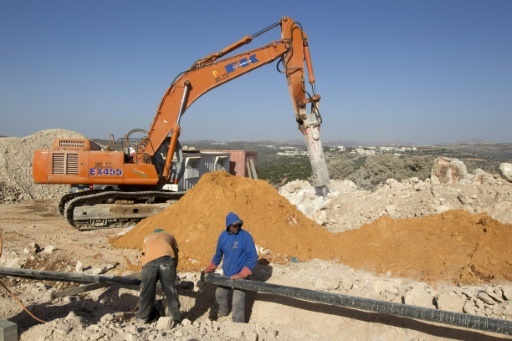 Israel legalises hundreds of West Bank settler homes