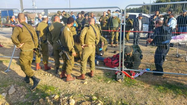 Israeli soldiers at the scene of the stabbing attack in Gush Etzion the West Bank