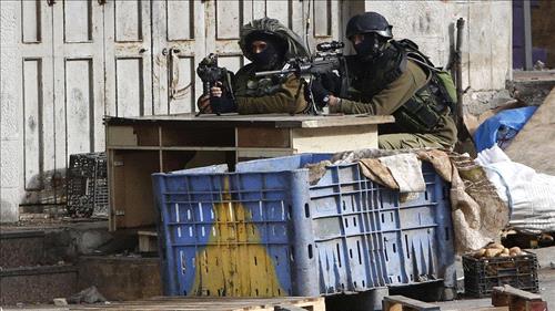 Israeli troops raid W. Bank hospital, kill Palestinian