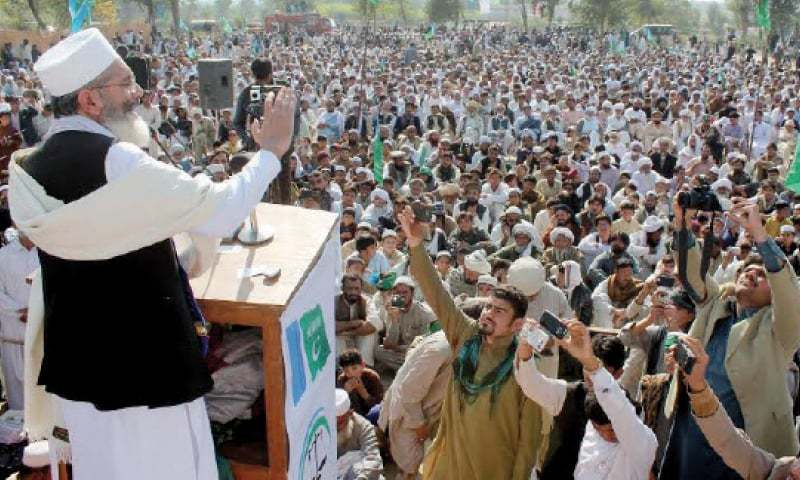 JI chief Sirajul Haq addresses a public meeting in Bannu on Sunday. &mdash Dawn