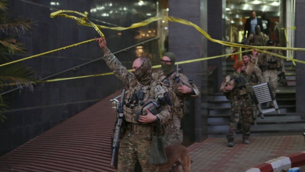 French soldiers leave the Radisson Blu hotel in Bamako Mali after the Islamic militant siege which saw 20 hostages die