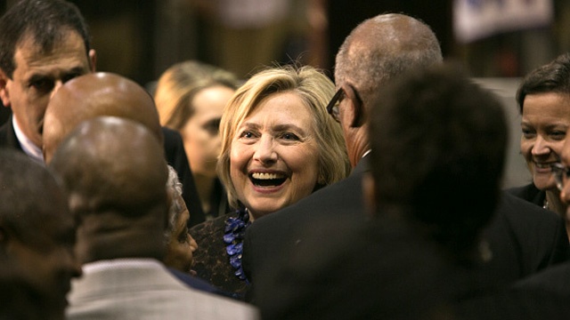 Clinton smiles